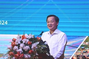 Deputy Prime Minister Le Minh Khai chairs a meeting held by the coordinating council for the Mekong Delta region in Ca Mau province on July 1. (Photo: SGGP)