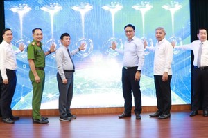 Delegates attend the launching ceremony of the information management system in Thu Duc City on August 7. (Photo: SGGP)