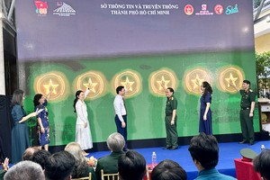 At the opening ceremony of the book week celebrating the 80th founding anniversary of the Vietnam People's Army (VPA) and the 35th anniversary of the All People's Defence Festival in HCMC (Photo: SGGP)
