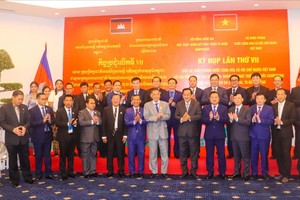 Delegates attend the meeting. (Photo: SGGP)