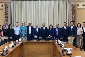 Delegates attend the meeting.