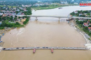 New Phong Chau Bridge will be open to traffic on September 28. (Photo: SGGP)