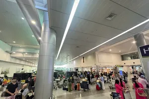 Busy New Year’s day at Tan Son Nhat International Airport’s T3 Terminal (Photo: SGGP)