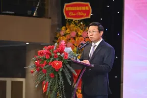 Deputy Head of the Party Central Committee's Commission for Propaganda and Mass Mobilization Tran Thanh Lam speaks at the event. (Photo: SGGP)