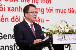 Vietnamese Deputy Minister of Finance Tran Quoc Phuong speaks at the event. (Photo: Nhandan)
