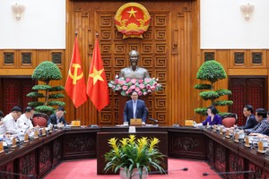 A view of the meeting of the Government’s standing members in Hanoi on March 21. (Photo: VGP)