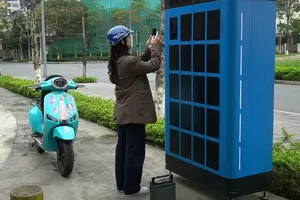 Battery-swapping cabinets for electric motorbikes will be installed across public spaces in Hanoi. (Photo: SGGP)
