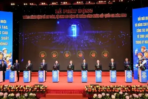 Delegates press the button to officially launch the Workers’ Month and the Month of Action on Occupational Safety and Health 2026. (Photo: SGGP)