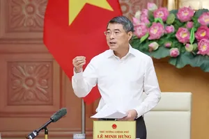 Prime Minister Le Minh Hung speaks at the working session with the State Bank of Vietnam on April 29. (Photo: SGGP)