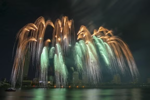 Fireworks over the banks of the Han River in Da Nang. The city's fireworks event has been chosen as one of nine must-experience summer festivals in the world by Travel + Leisure Asia. (Photo courtesy of DIFF)
