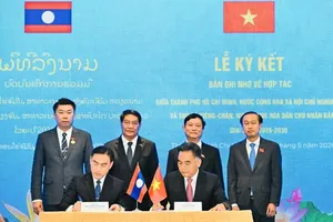 HCMC, Vientiane sign memorandum of understanding on cooperation