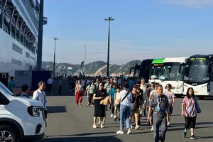 Cruise passengers come ashore to begin exploring Khanh Hoa.