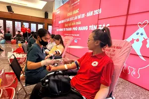 Volunteers participate in a blood donation drive on June 11.