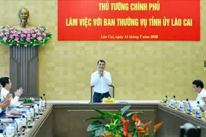 Prime Minister Le Minh Hung attends a working session with the Lao Cai provincial Party Committee's Standing Board in Yen Bai ward on July 14, 2026. (Photo: SGGP)