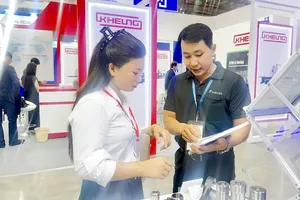 Businesses showcase products and explore business matching opportunities at the 22nd International Precision Engineering and Manufacturing Exhibition and Conference (MTA Vietnam 2026). (Photo: SGGP)