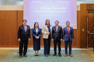 Delegates from Vietnam and Austria attend the dialogue. (Photo: State Securities Commission)