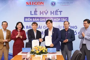 The signing ceremony for the Memorandum of Understanding between Ho Chi Minh City University of Law and Sai Gon Giai Phong Newspaper, September 18 (Photo: SGGP)