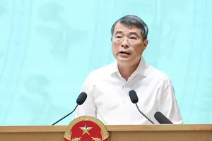 Prime Minister Le Minh Hung speaks at the meeting on science and technology contributions to socio-economic development in Hanoi on September 28. (Photo: SGGP)