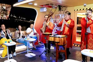Tourists enjoy music aboard Saigon WaterGO. (Photo; SGGP)