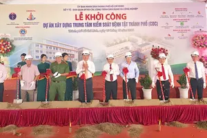Delegates perform the groundbreaking ceremony.