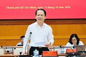 Minister of Justice Hoang Thanh Tung speaks at the meeting. (Photo: SGGP)