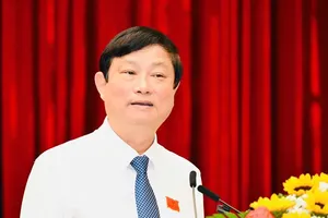 Chairman of the Ho Chi Minh City People's Council Vo Van Minh delivers his speech at the session. (Photo: SGGP)