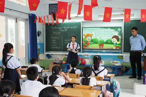 Học sinh Trường Tiểu học Đặng Trần Côn (phường Vĩnh Hội) trong một giờ học. Ảnh minh họa.