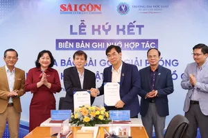 Báo Sài Gòn Giải Phóng và Trường Đại học Luật TPHCM ký kết Biên bản ghi nhớ hợp tác