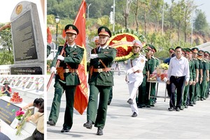 退伍军人、烈士家属悼念在北方边境保卫战中牺牲的英雄烈士。