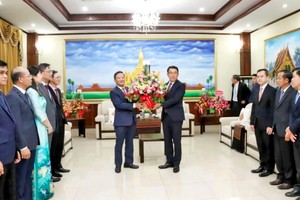 致电祝贺老挝人民革命党成立 70 周年