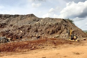 德农准许投资用于整平地面砂石矿