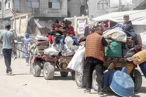 以色列暂停向加沙地带北部运送援助物资