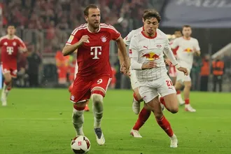 Harry Kane (trái) tỏa sáng rực rỡ trong màu áo Bayern Munich và đội tuyển Anh. Ảnh: THX