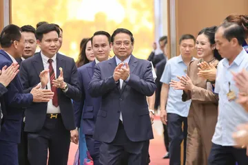 Thủ tướng Phạm Minh Chính đến hội nghị "doanh nghiệp góp phần vào tăng trưởng hai con số và Thủ tướng Chính phủ tri ân doanh nghiệp". Ảnh: VIẾT CHUNG