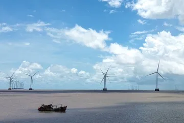 Tỉnh Cà Mau có nhiều tiềm năng thu hút đầu tư các dự án điện gió. Ảnh chụp tại điện gió Tân Thuận.