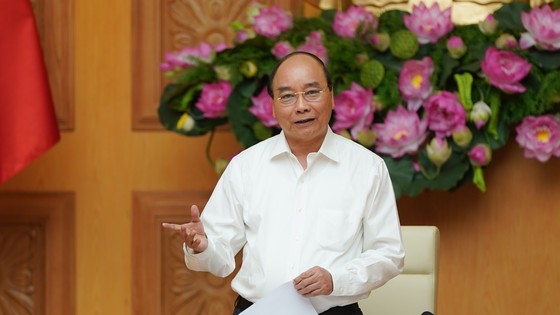 Thủ tướng Nguyễn Xuân Phúc chủ trì họp ngày 9-7, ảnh QUANG PHÚC