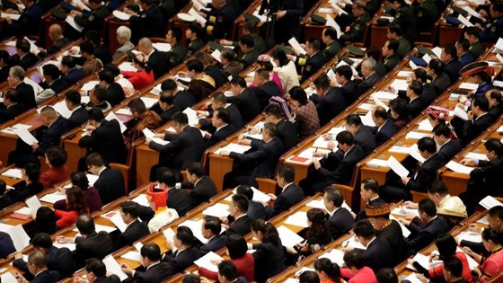 Delegates attend the opening session of the National People's Congress at the Great Hall of the People in Beijing in March 2019: A delay due to the coronavirus outbreak is unlikely to affect fiscal policy much. © Reuters