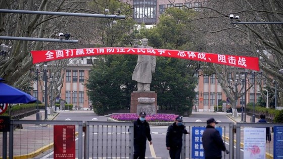 Security guards standing in front of an entrance to Tongji University in Shanghai on March 12. PHOTO: ALY SONG/REUTERS