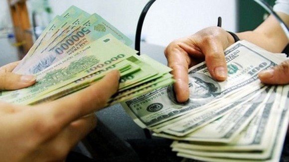 Mua bán ngoại tệ không đúng quy định sẽ bị xử phạt. Ảnh minh họa
