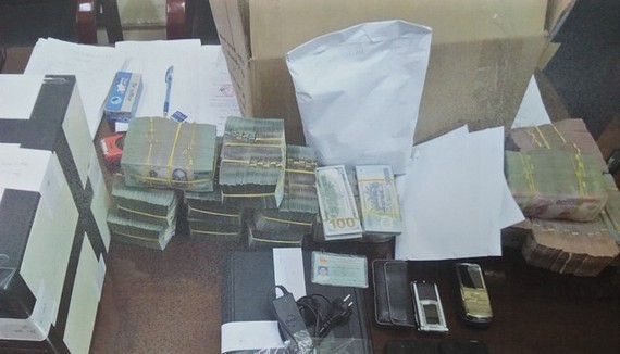 The police officers seize exhibits