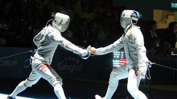 Vu Thanh An (left) competes at the 30th SEA Games last December in the Philippines. An is expecting to win his second Olympic berth in Tokyo this year. VNA/VNS Photo