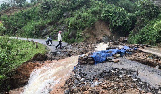 Huge flooding separates traffic roads through Bat Xat District, Lao Cai Province