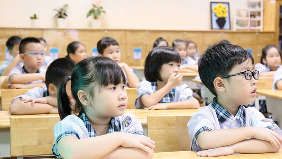 Học sinh lớp 1 Trường Tiểu học Lê Đức Thọ, quận Gò Vấp, TPHCM trong một tiết học. Ảnh: HOÀNG HÙNG