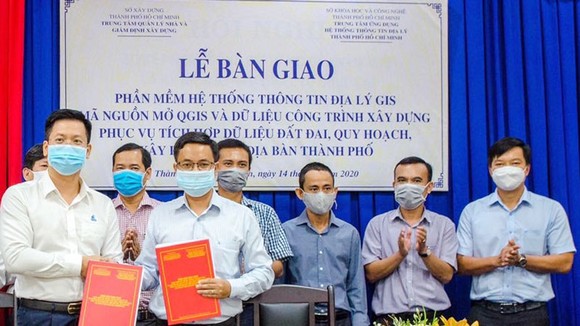 Quang cảnh công bố Phần mềm hệ thống thông tin địa lý GIS mã nguồn mở phục vụ quản lý dữ liệu công trình xây dựng. Ảnh: VIỆT DŨNG
