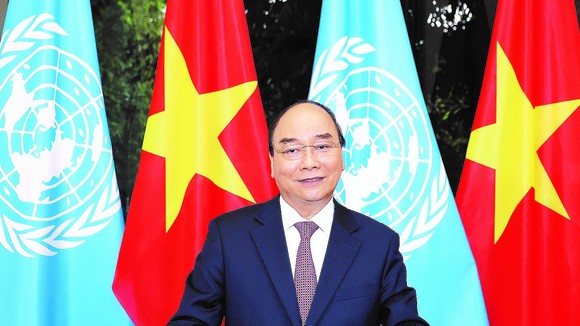Thủ tướng Nguyễn Xuân Phúc đọc thông điệp gửi tới Phiên thảo luận chung cấp cao của Đại hội đồng Liên hiệp quốc khóa 75. Ảnh: TTXVN