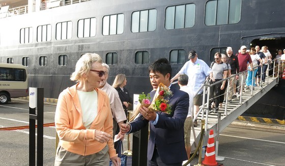 At welcoming ceremony greeting first international cruise visitors on the lunar New Year