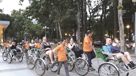 Foreign visitors in HCMC. (Photo: VNS)