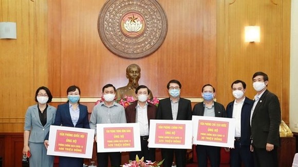 The VFF central Committee receives funds from the Party Central Committee Office, the Government Office, the National Assembly Office, and the President Office (Photo: dangcongsan.vn)