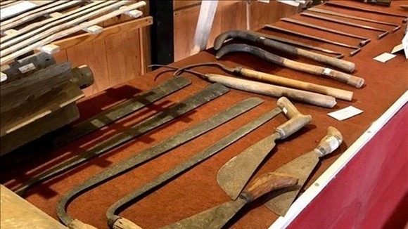 Agricultural and fishing tools related to the process of reclamation and establishment of villages by farmers in Vinh Long province (Photo: VNA)