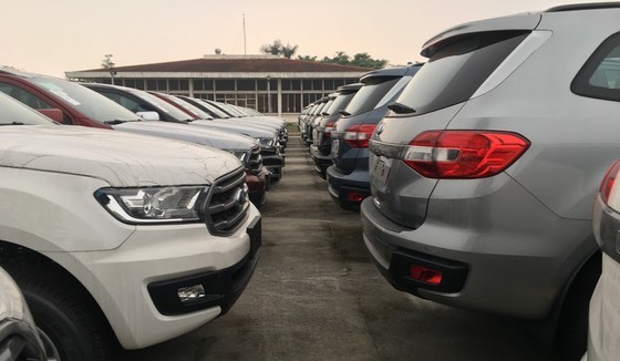 Imported cars gather in parking lots in Sai Dong Ward in Hanoi's Long Bien District